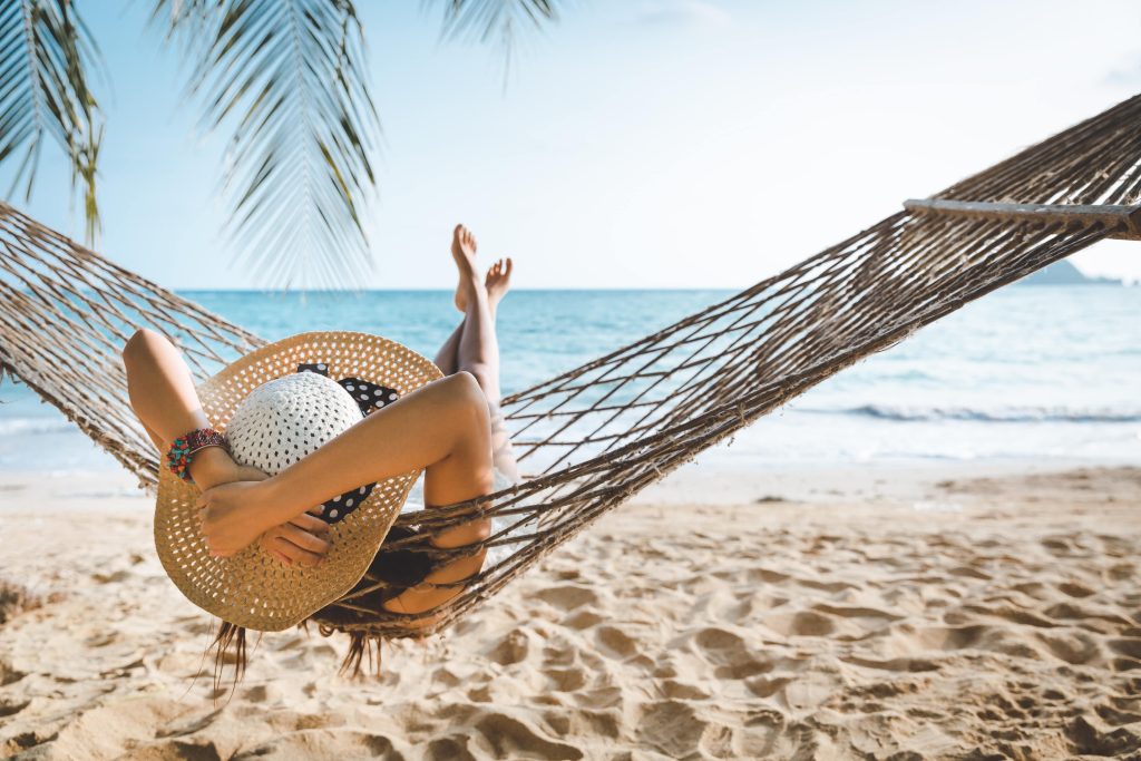 Woman In The Beach Relaxing